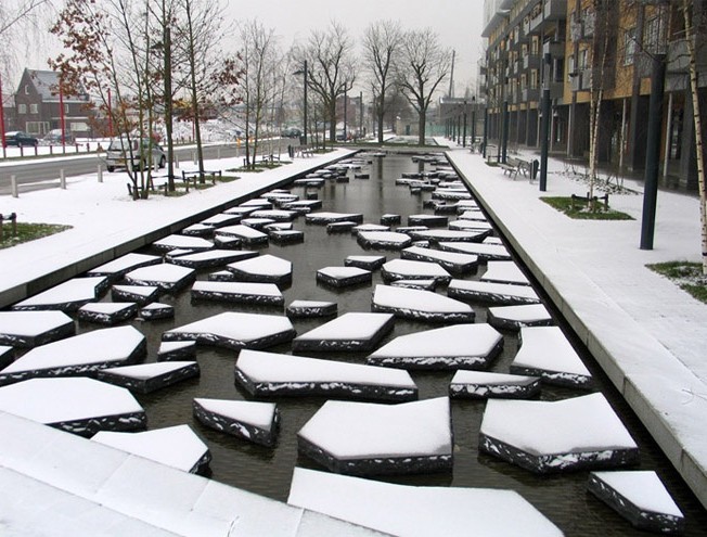 Unusual City Center Pedestrian Street  With a Cracked Stones Like Pattern